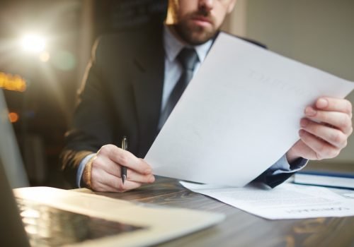 businessman-working-with-documentation-desk