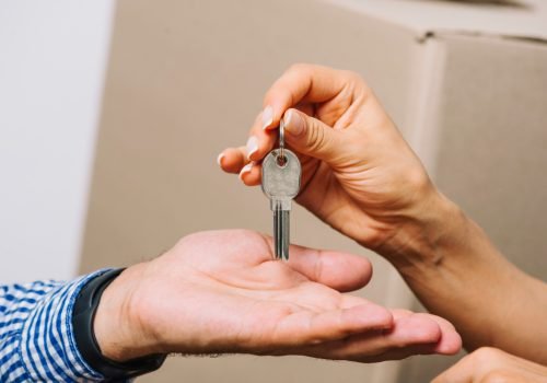 crop-people-exchanging-with-keys