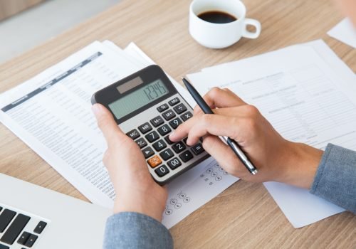 finance-accounting-paper-desk-using