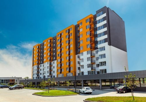 new-block-modern-apartments-with-balconies-blue-sky-background (1)