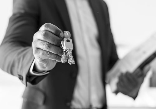 real-estate-agent-handing-the-house-key