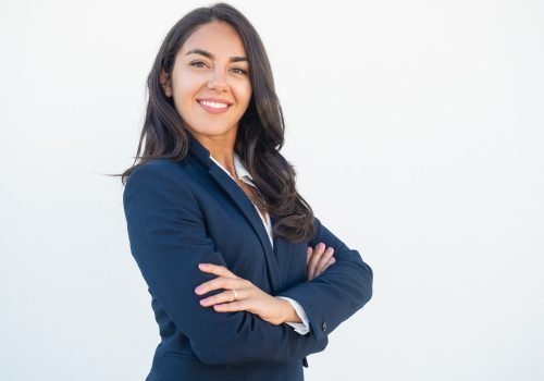 smiling-confident-businesswoman-posing-with-arms-folded