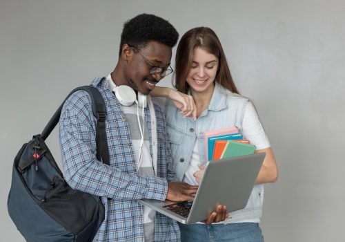 students-with-laptop-medium-shot